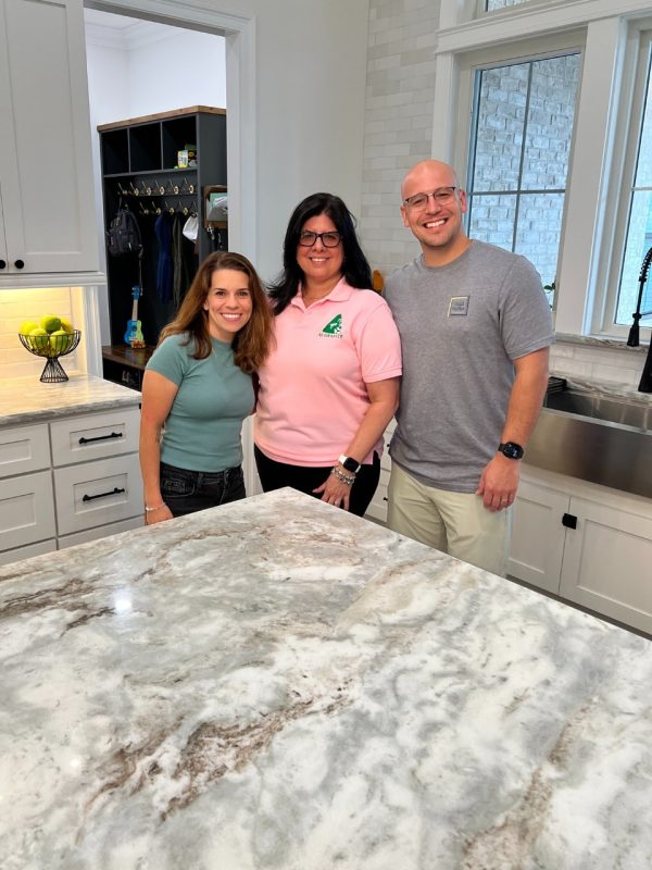 Marisabelle 5-star review new home countertops A1 Granite Tallahassee Picture with Betty and her husband